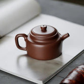 Purple clay teapot