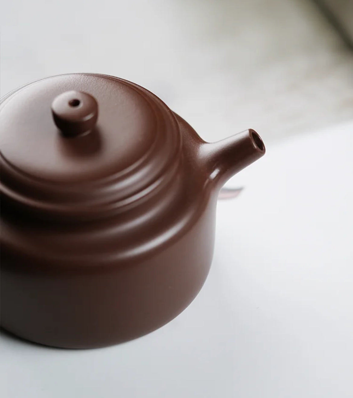 Purple clay teapot