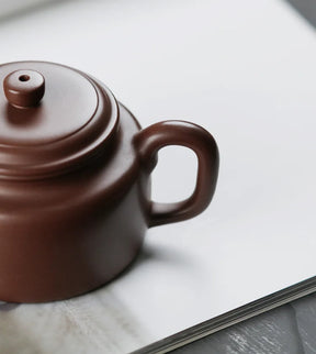 Purple clay teapot